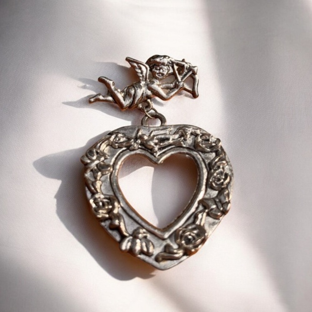 Cupid heart brooch. Vintage signed. Victorian revival brooch